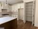 Well-lit kitchen with a white countertop island and stainless steel appliances at 555 Discovery Lake Dr, Fayetteville, GA 30215