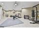 Fully equipped basement gym with various exercise machines, weights, and a punching bag at 310 Westbourne Dr, Tyrone, GA 30290