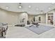 Basement gym with modern exercise equipment and a spacious workout area at 310 Westbourne Dr, Tyrone, GA 30290