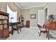 Bright home office with natural light, two writing desks, and sophisticated decor at 310 Westbourne Dr, Tyrone, GA 30290