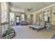 Relaxing covered porch featuring comfortable seating and a serene outdoor ambiance at 310 Westbourne Dr, Tyrone, GA 30290