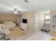 Large multi-purpose room with a television, work out equipment, and comfortable seating at 1466 Lake Forest Ln, Mcdonough, GA 30253