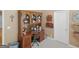 Office space with built-in desk and plenty of shelving for storage and decor at 1466 Lake Forest Ln, Mcdonough, GA 30253
