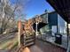 Backyard wooden deck and stairs leading to backyard with privacy fence at 177 Villa Rosa Way, Temple, GA 30179