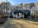 Charming single-story home with a covered front porch and a well-maintained lawn at 177 Villa Rosa Way, Temple, GA 30179