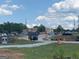 Street view of a busy street corner with a drug store and general retail at 13090 Brown Bridge Rd, Covington, GA 30016
