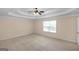 Spacious bedroom featuring neutral walls, carpet floors, ceiling fan and a window at 3183 Jackson Creek Dr, Stockbridge, GA 30281