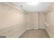 Walk in closet with multiple rows of metal shelving around the perimeter at 3183 Jackson Creek Dr, Stockbridge, GA 30281