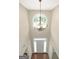 Grand foyer featuring a chandelier, high ceilings, and hardwood floors at 3183 Jackson Creek Dr, Stockbridge, GA 30281