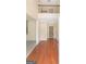 Bright, two-story foyer with hardwood floors and a view of the upper-level balcony at 3183 Jackson Creek Dr, Stockbridge, GA 30281