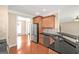 Spacious kitchen featuring granite countertops and stainless steel refrigerator at 3183 Jackson Creek Dr, Stockbridge, GA 30281