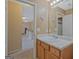 Bathroom with single vanity and access to upstairs hallway at 6697 Princeton Park Walk, Lithonia, GA 30058