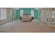 Spacious main bedroom with arched windows, soft carpet, and neutral decor at 6697 Princeton Park Walk, Lithonia, GA 30058