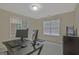Office with a desk and multiple computer monitors at 6697 Princeton Park Walk, Lithonia, GA 30058