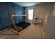 Bedroom features a modern accent wall and a unique toddler bed frame at 8045 Coleson Xing, Locust Grove, GA 30248