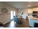 Bright dining area featuring a modern table set, and with doors to outdoor area at 8045 Coleson Xing, Locust Grove, GA 30248