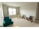 Well-lit playroom with ample space for activities and relaxation at 8045 Coleson Xing, Locust Grove, GA 30248