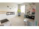 Spacious playroom featuring an abundance of natural light and learning/play items at 8045 Coleson Xing, Locust Grove, GA 30248