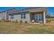 Nice covered patio and well-maintained backyard at 346 Friendship Oak Way, Hampton, GA 30228
