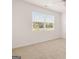 Bedroom with large window allowing plenty of natural light to fill the room at 346 Friendship Oak Way, Hampton, GA 30228