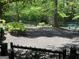 View of fenced dog park with seating, waste station, and mulch ground covering, surrounded by green foliage at 3108 Westchester Ne Rdg, Atlanta, GA 30329