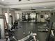 Spacious gym with ample natural light, a variety of exercise equipment, mirrors, and durable rubber flooring at 3108 Westchester Ne Rdg, Atlanta, GA 30329