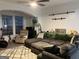 Cozy living room featuring a comfortable sectional sofa, a cozy recliner, and stylish decor at 3108 Westchester Ne Rdg, Atlanta, GA 30329