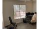 Office/flex space with large windows, gray flooring, and workout equipment at 3108 Westchester Ne Rdg, Atlanta, GA 30329