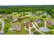 Aerial view of the neighborhood with manicured lawns, mature trees, and golf course at 770 Tralee Dr, Fayetteville, GA 30215