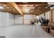 Unfinished basement with painted walls and exposed ceiling, ready for customization and ample storage at 770 Tralee Dr, Fayetteville, GA 30215