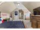 Charming bedroom featuring baseball decor and a cozy carpeted floor at 770 Tralee Dr, Fayetteville, GA 30215