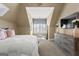 Bedroom boasting a large bed, plush carpet, and neutral decor with soft accents at 770 Tralee Dr, Fayetteville, GA 30215