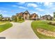 Beautiful home with long driveway and well manicured lawn and landscaping at 770 Tralee Dr, Fayetteville, GA 30215