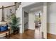 Inviting foyer with hardwood floors, staircase and an open view to the living room beyond at 770 Tralee Dr, Fayetteville, GA 30215