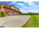 Spacious three car garage and a large driveway with plenty of room for parking at 770 Tralee Dr, Fayetteville, GA 30215