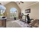 Bright home office with a vaulted ceiling, ample natural light, and stylish decor at 770 Tralee Dr, Fayetteville, GA 30215