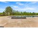 A luxurious pool with tiled jacuzzi, travertine deck, and manicured lawn, perfect for relaxation and outdoor enjoyment at 770 Tralee Dr, Fayetteville, GA 30215