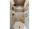 Tiled shower with glass door, rainfall shower head and built-in seat at 770 Tralee Dr, Fayetteville, GA 30215