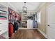 Large walk-in closet with custom shelving and hardwood floors at 770 Tralee Dr, Fayetteville, GA 30215