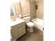 Bathroom featuring a vanity with storage, a tiled shower/tub combo, and neutral wallpaper at 2425 Wood Valley Dr, Morrow, GA 30260
