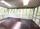 Screened porch with wood lattice ceiling, ceiling fan and beautiful backyard views at 2425 Wood Valley Dr, Morrow, GA 30260