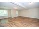 Living room with recessed lighting and wood-style flooring, and a walkout at 10074 Tara Glynn Dr, Hampton, GA 30228