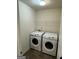 Laundry room featuring a new washer and dryer at 136 Paulownia Cir, Mcdonough, GA 30253