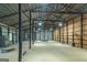 Barn with storage and basketball hoop, with high ceilings and natural light at 877 Honey Creek Rd, Mcdonough, GA 30252