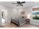 Cozy bedroom with hardwood floors, natural light, and an inviting atmosphere at 877 Honey Creek Rd, Mcdonough, GA 30252
