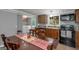 Open-concept kitchen with modern appliances and a cozy dining area at 877 Honey Creek Rd, Mcdonough, GA 30252
