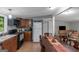 Inviting kitchen with ample cabinetry and seamless flow into the living room and dining areas at 877 Honey Creek Rd, Mcdonough, GA 30252