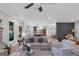 Open-concept living area with view into eat-in kitchen and dining area at 877 Honey Creek Rd, Mcdonough, GA 30252