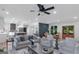Open-concept living area with view into eat-in kitchen and dining area at 877 Honey Creek Rd, Mcdonough, GA 30252