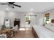 Stylish bedroom featuring a sliding barn door to the bathroom and plenty of natural light at 877 Honey Creek Rd, Mcdonough, GA 30252